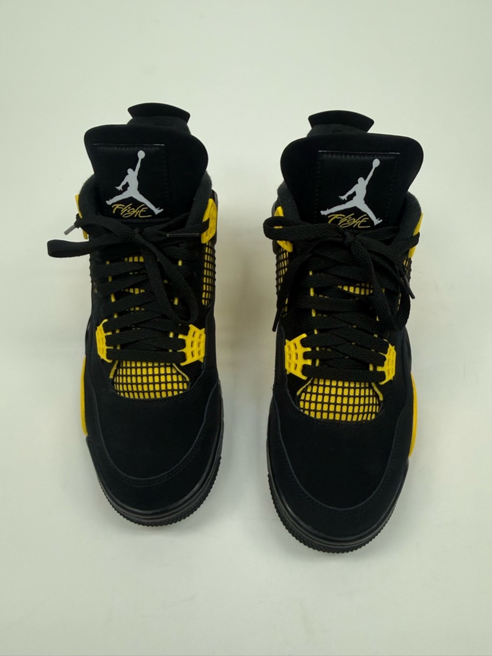 Jordan 4 Retro Thunder Black and Yellow Sneakers - Picture 2 of 6
